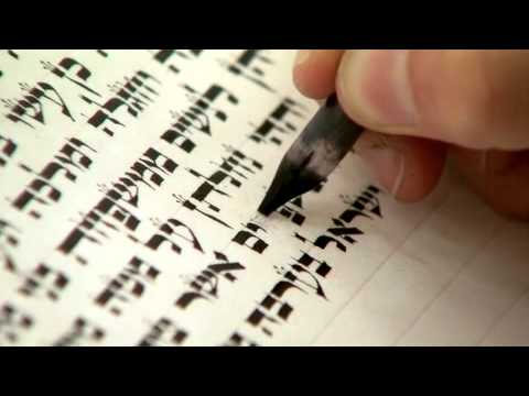 Writing a Torah scroll by hand