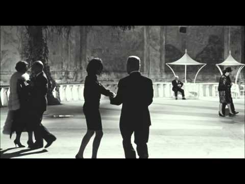 8½: Fellini's 8½ has Marcello and Carla dancing in an overhead-lit nightclub frame.