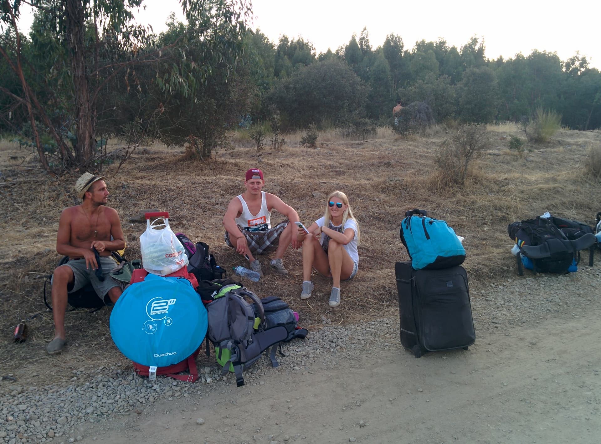 Waiting with luggage on the roadside, Boom 2014