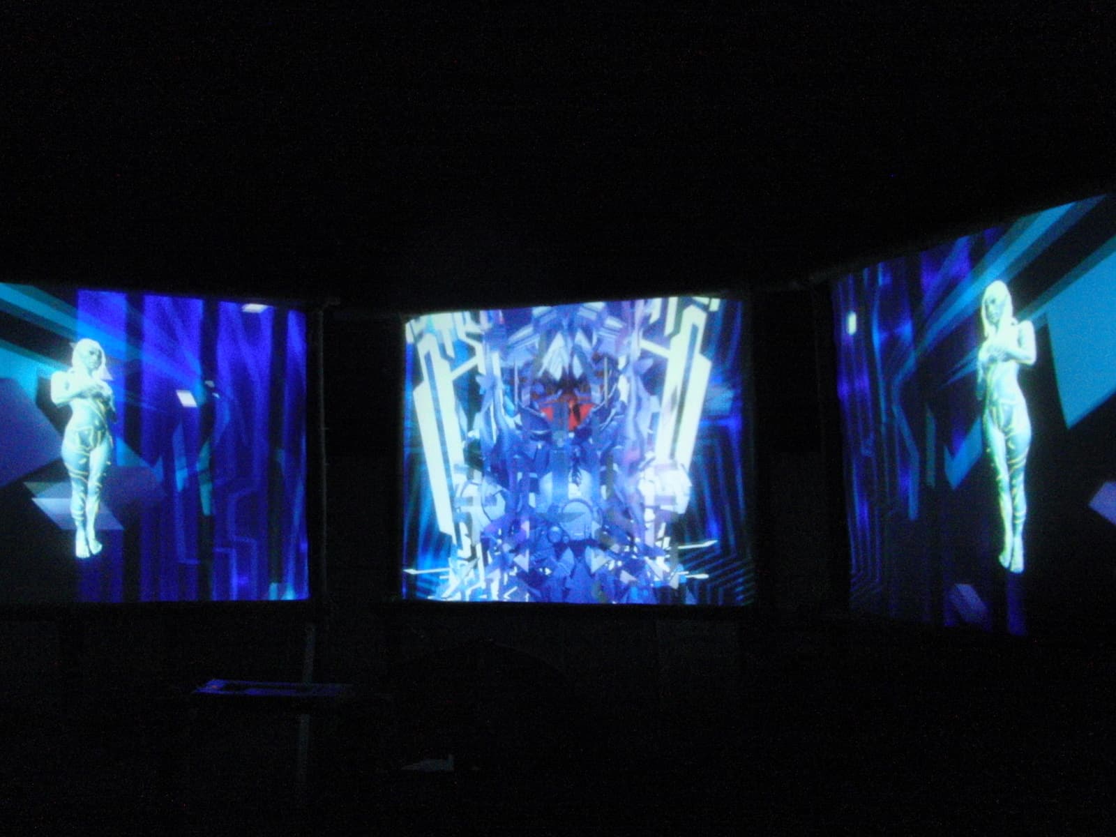 Figures projected across three screens, Boom 2010