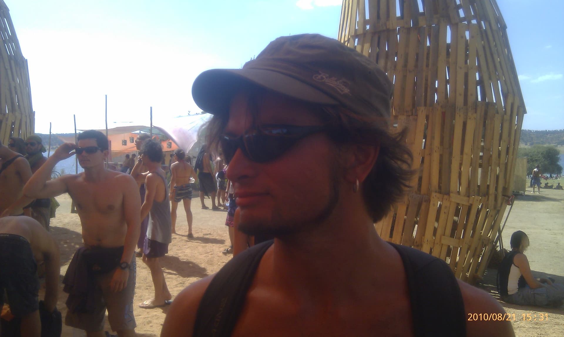 Festivalgoer beside the woven towers, Boom 2010
