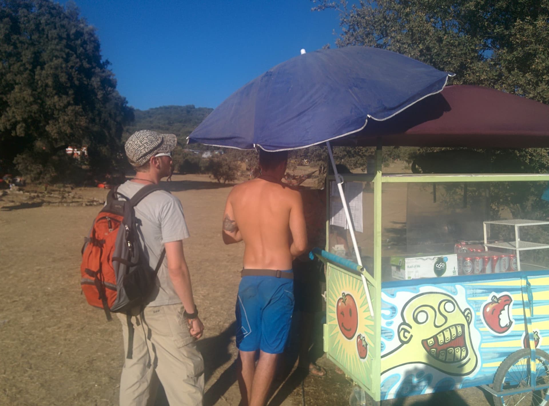 Queuing at a painted drinks kiosk, Boom 2014