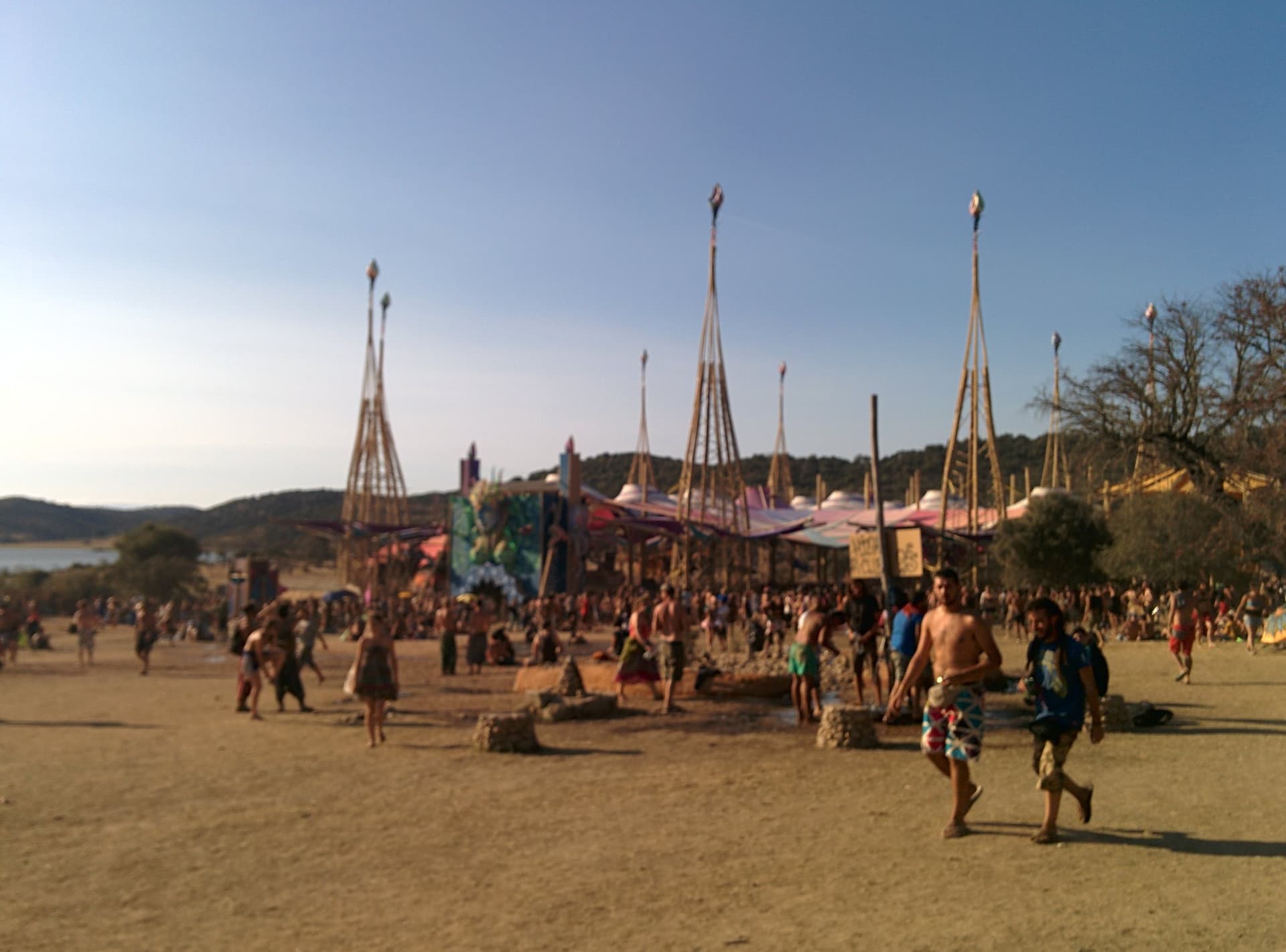 Masted lake stage seen across the sand, Boom 2014