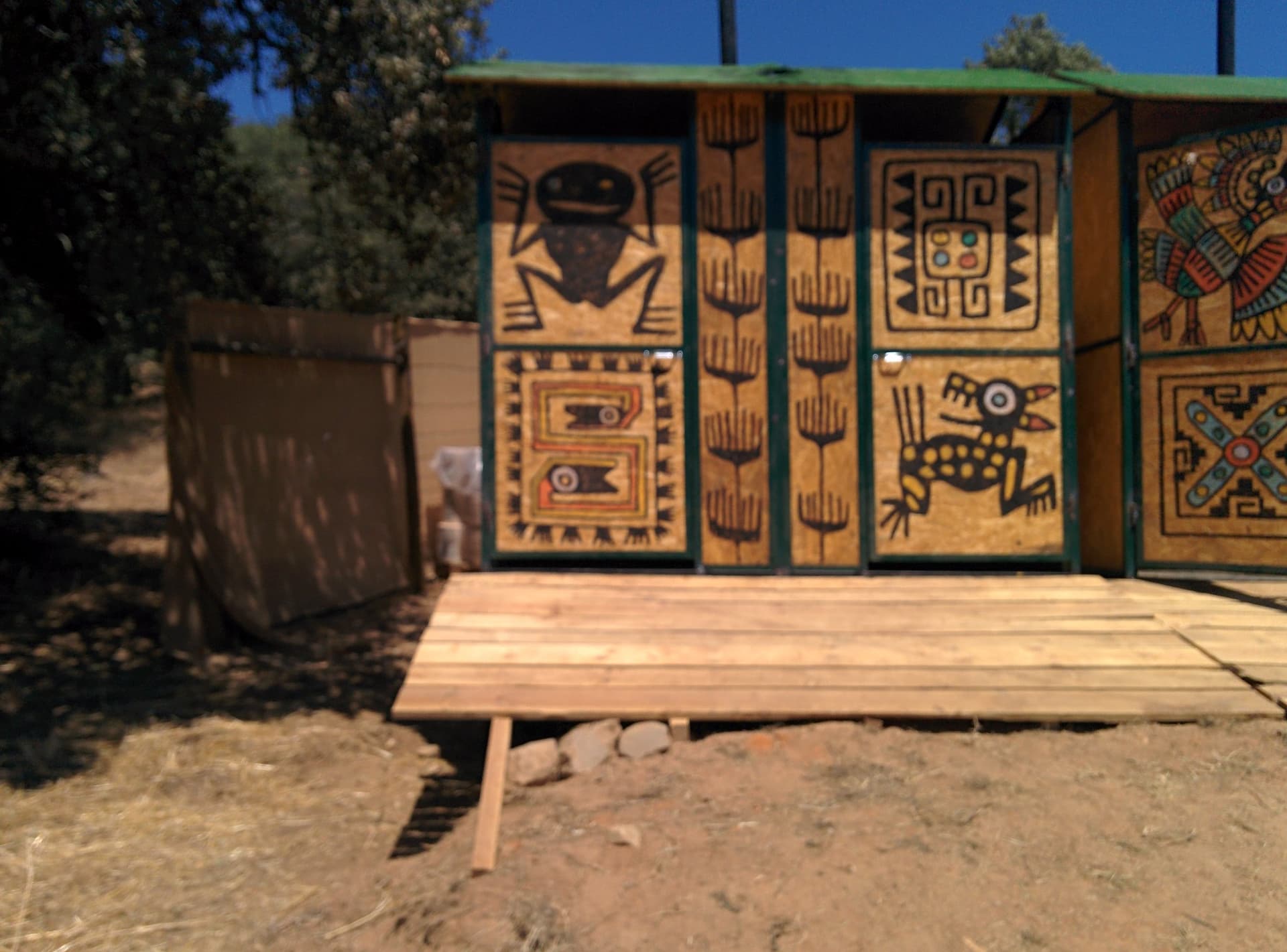Painted panels on the compost toilet block, Boom 2014