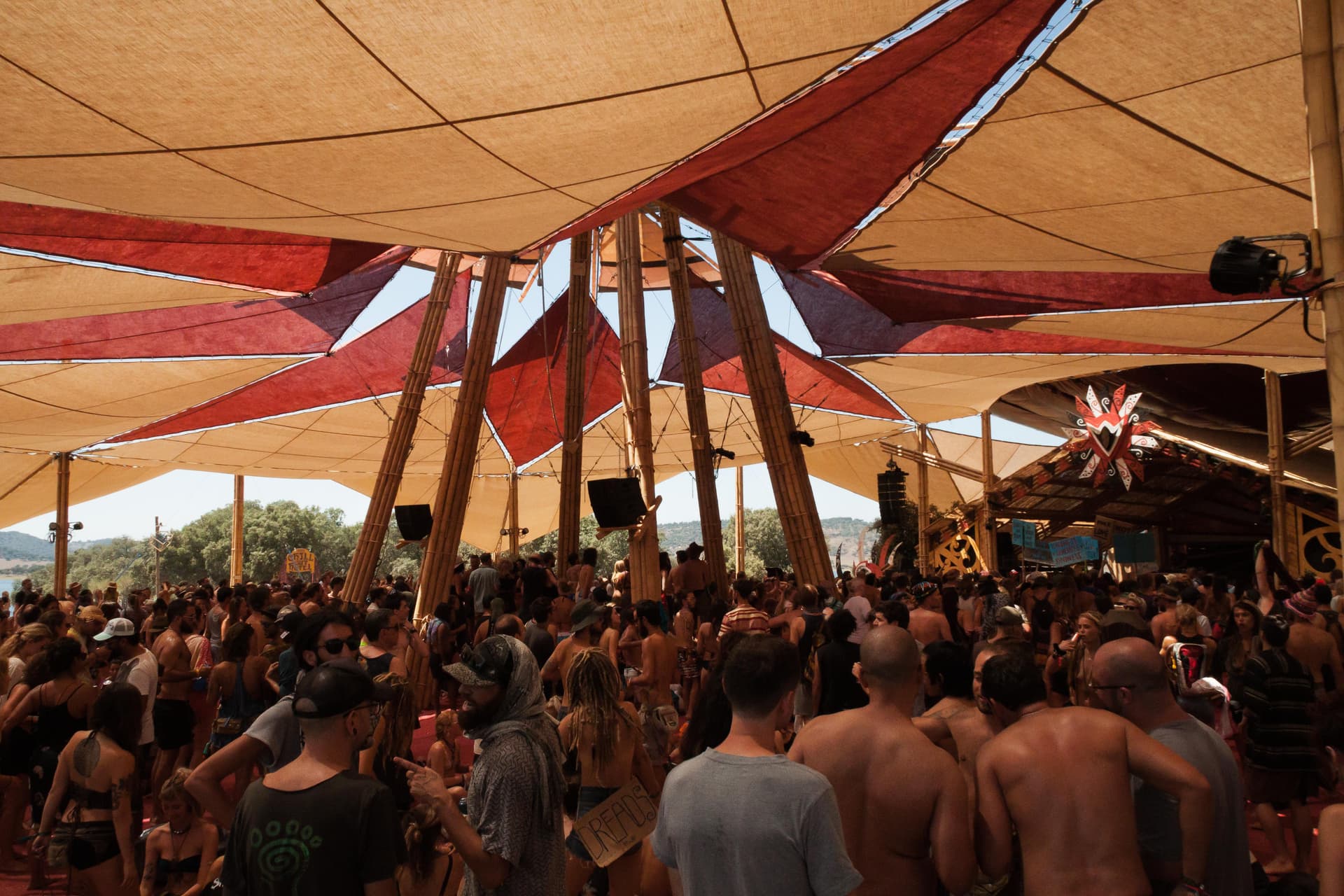 Crowd under the stage shade sails