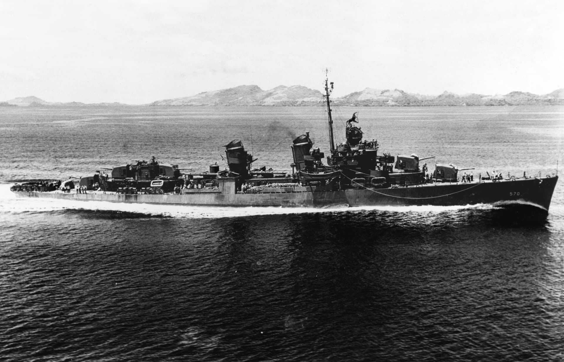 USS Charles Ausburne (DD-570) underway in the Solomon Islands, circa in 1943 (NH 59856)