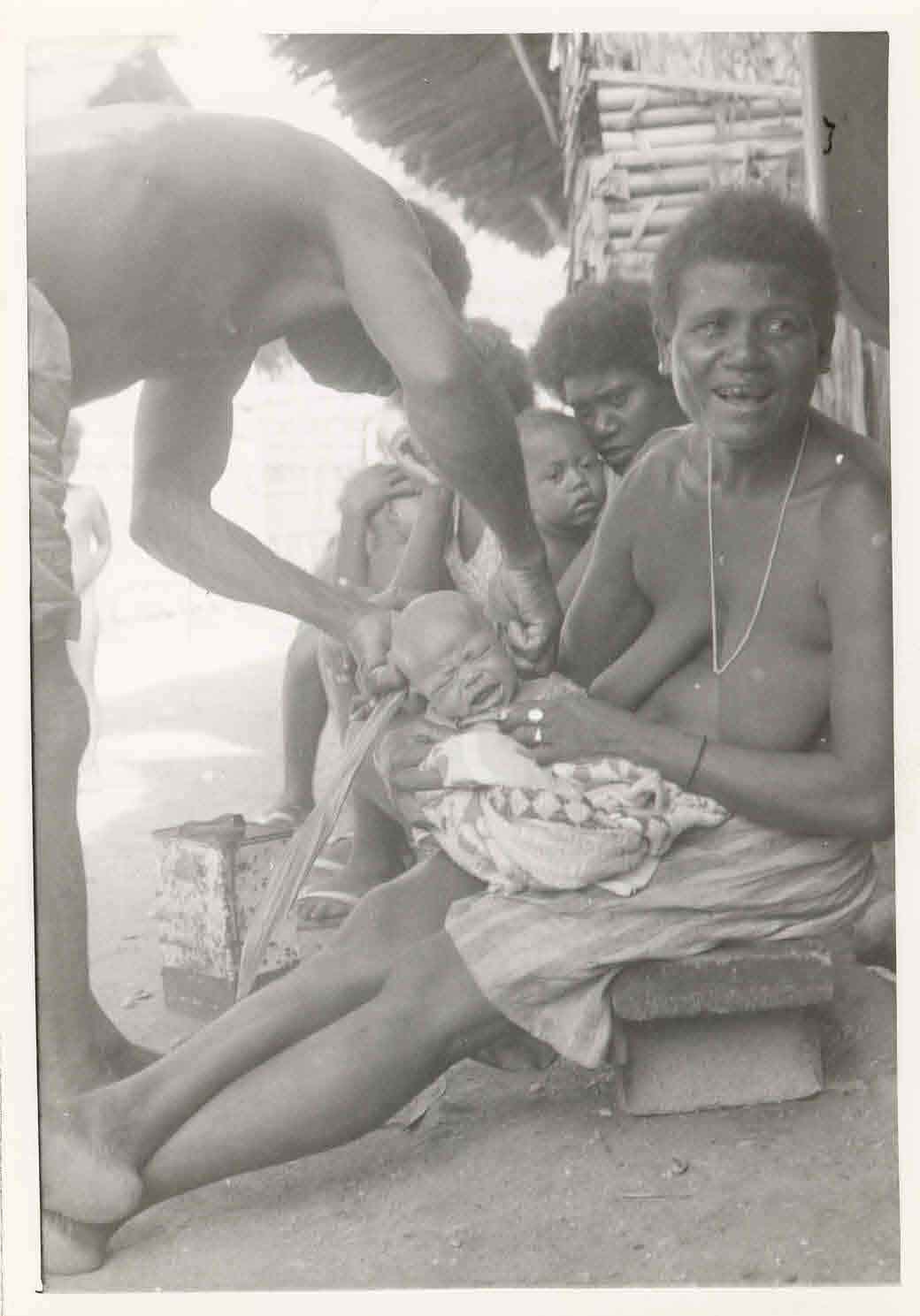 Rite readmitting a mother and newborn to the village