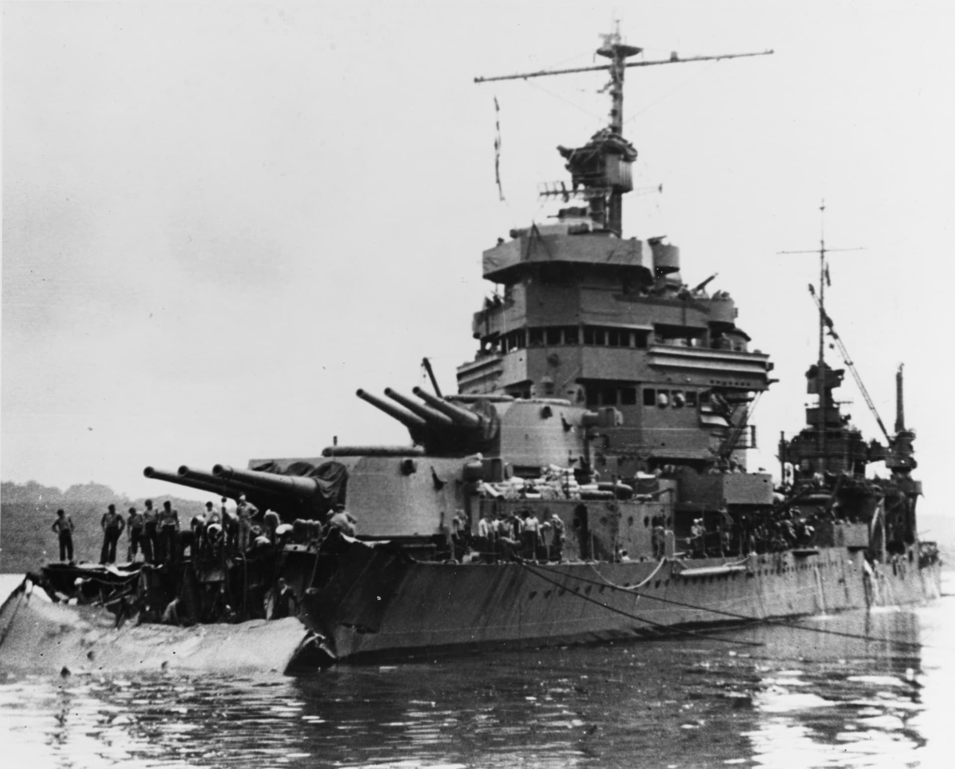 Damaged USS Minneapolis (CA-36) at Tulagi on 1 December 1942, after the Battle of Tassafaronga ( )