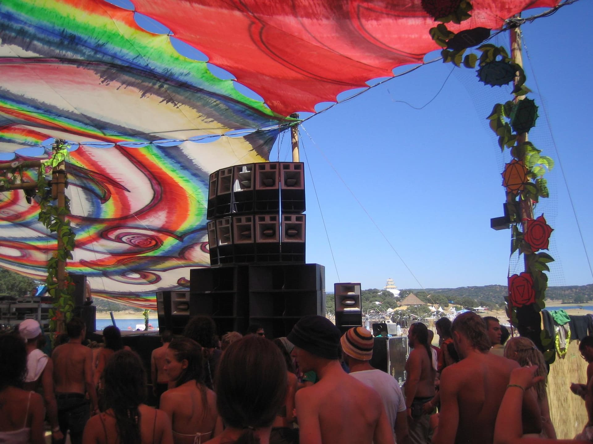 Speaker stacks beneath the painted canopy