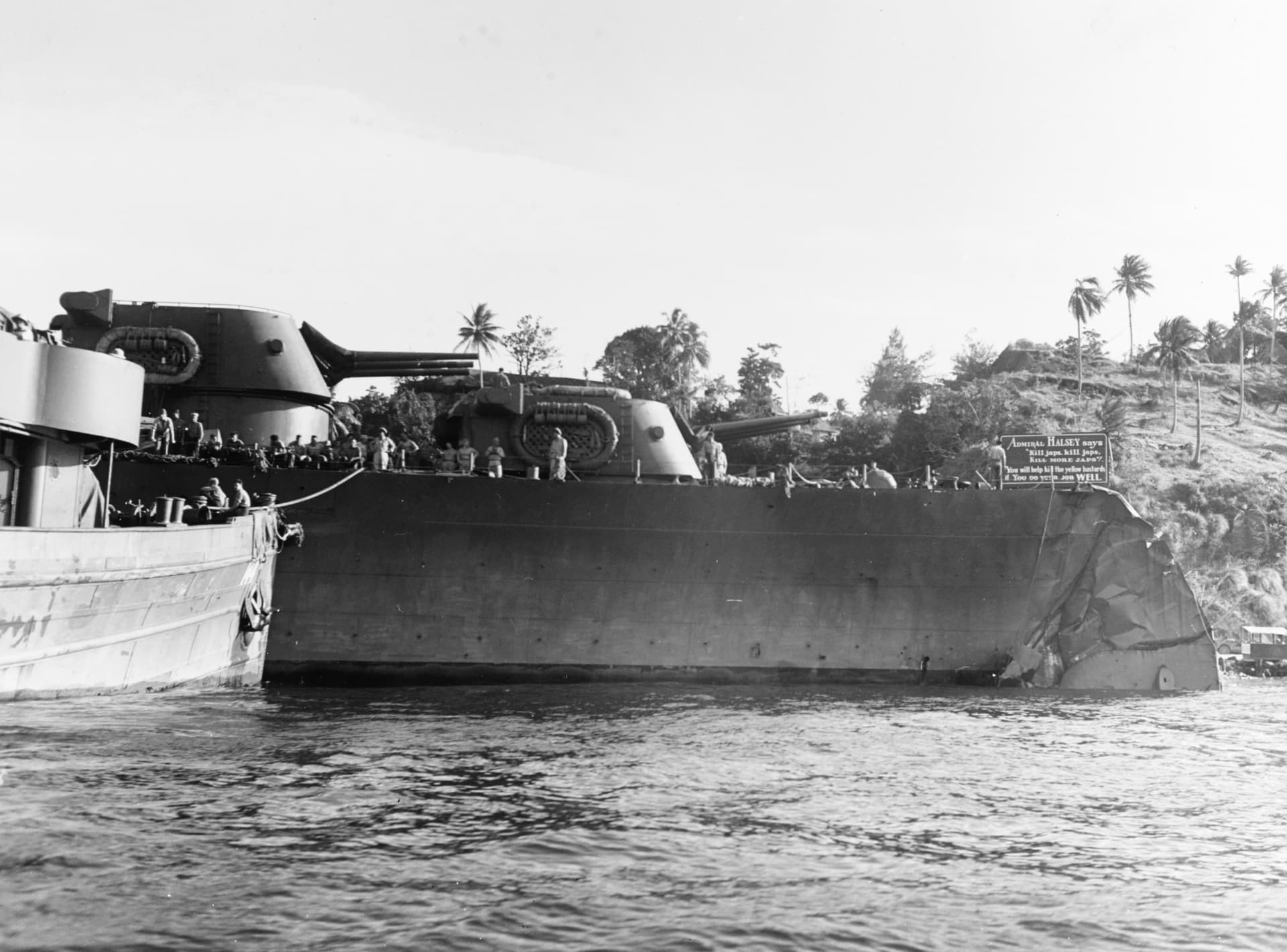 USS Honolulu (CL-48) in Tulagi Harbor after the Battle of Kolombangara, in July 1943 ( )