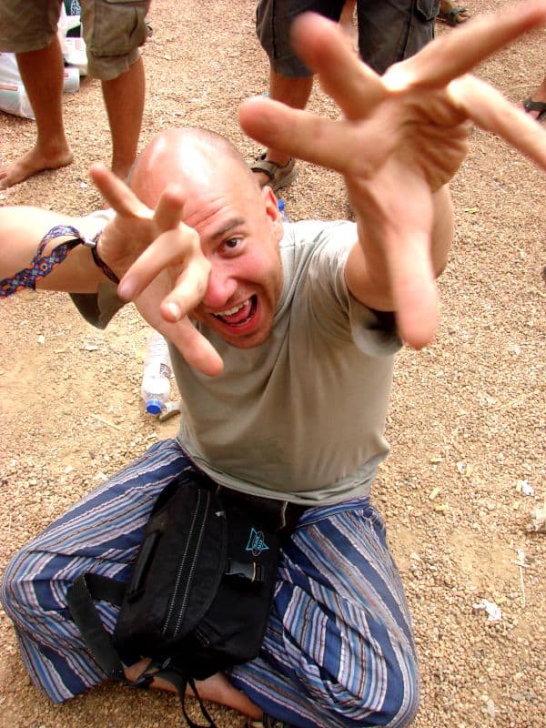Visitor gesturing towards the camera