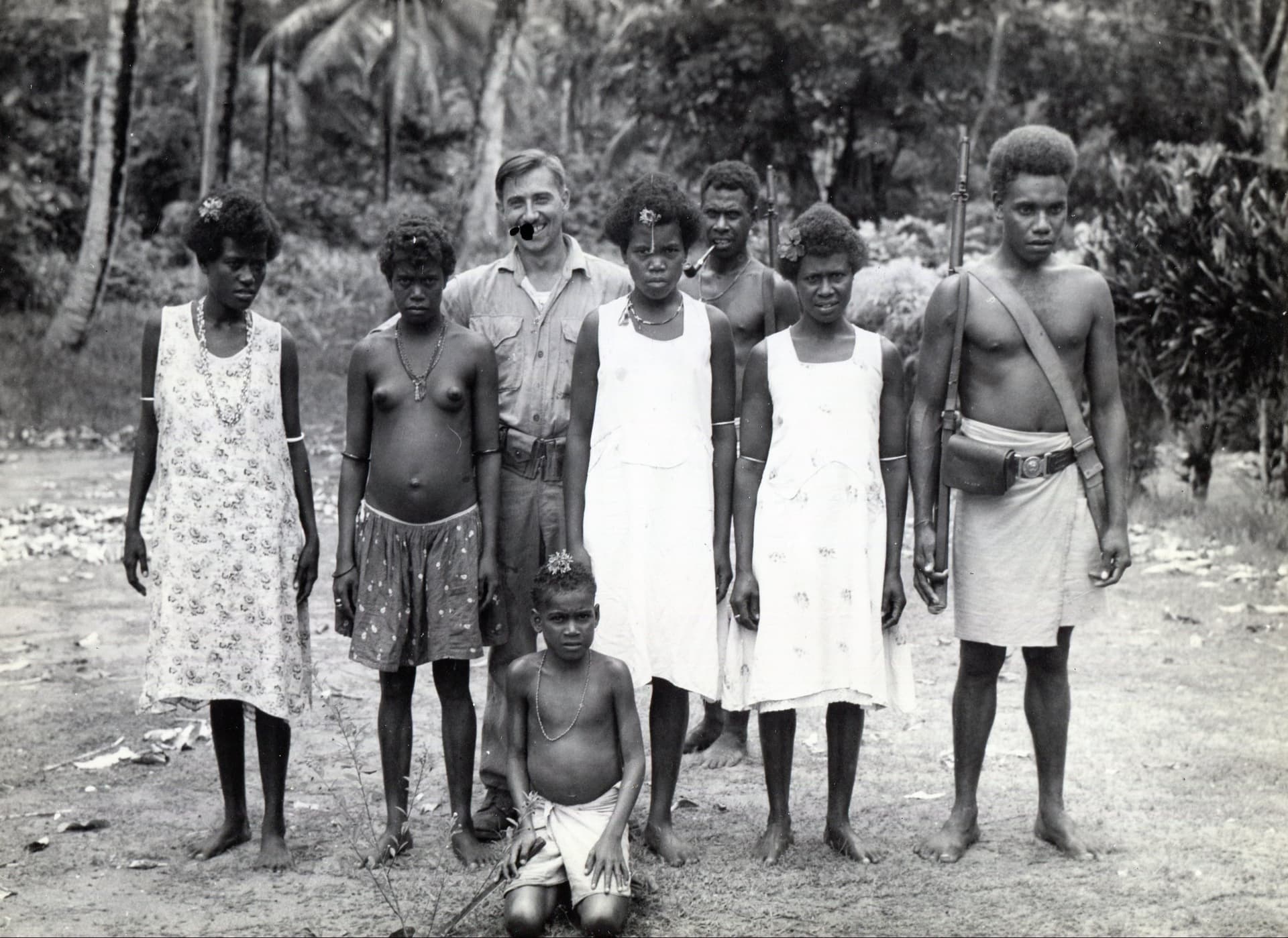 Marines, Guadalcanal Policemen, and Guadalcanal Women, circa 1942