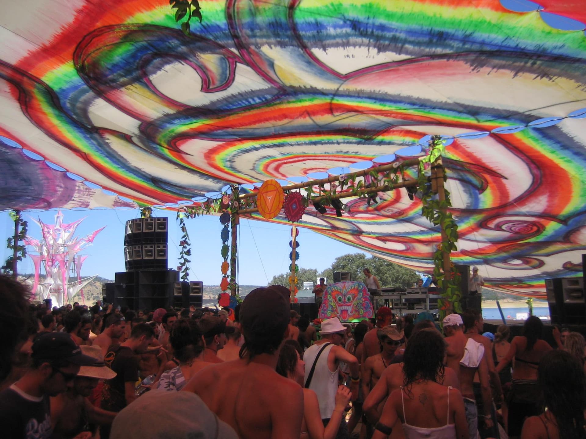 Crowd dancing under the spiral canopy