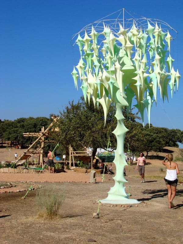 Painted sculptural tree with hanging leaves