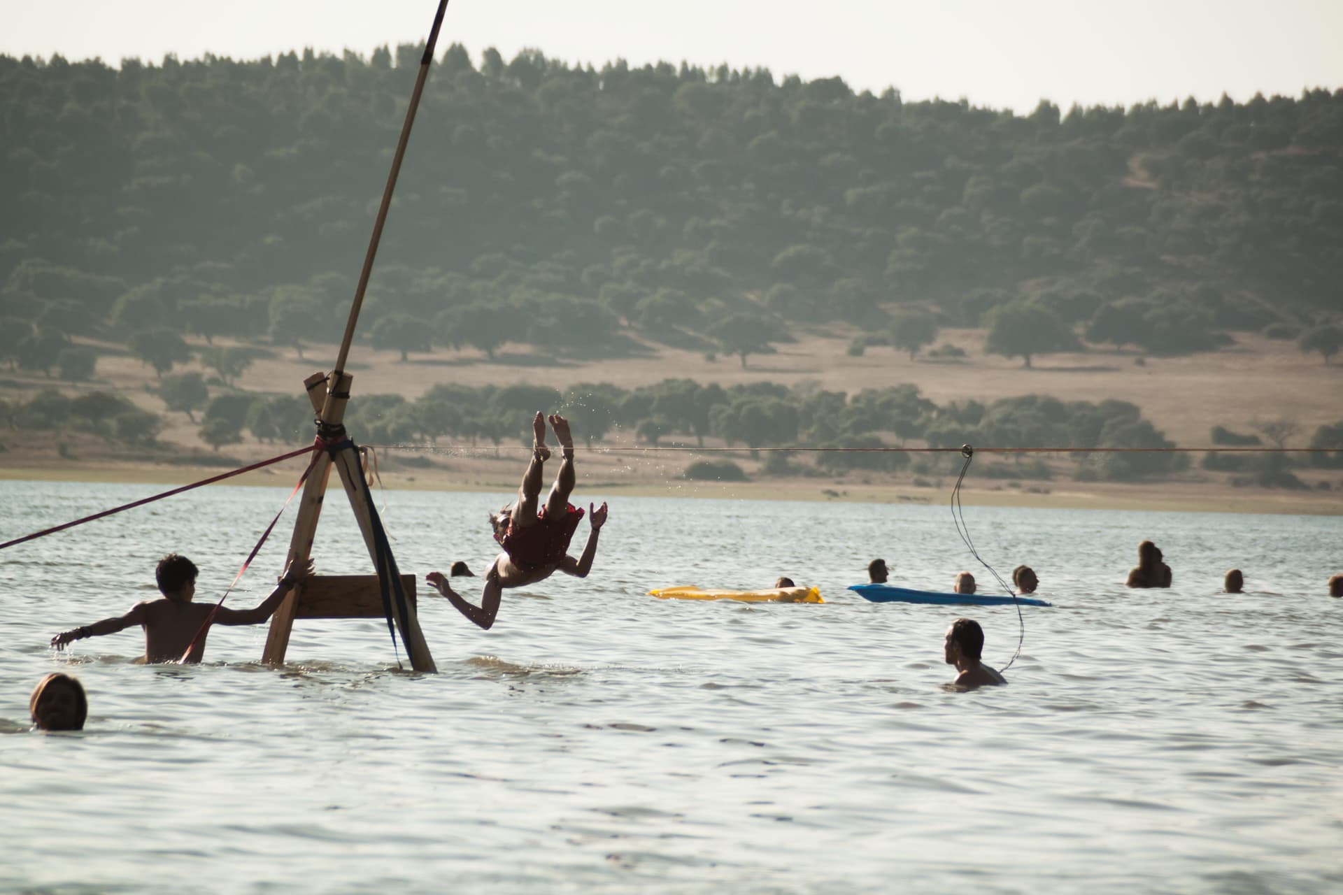 Swimmers and a rope swing on the reservoir